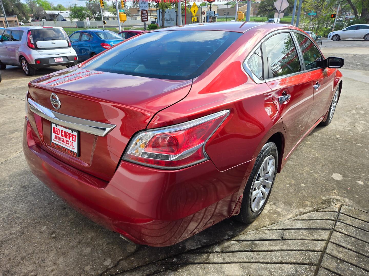 2015 Red Nissan Altima 2.5 S (1N4AL3AP9FC) with an 2.5L L4 DOHC 16V engine, Continuously Variable Transmission transmission, located at 503 West Court, Seguin, TX, 78155, (830) 379-3373, 29.568621, -97.969803 - 2015 Nissan Altima S with a 2.5L L4 DOHC 16V, Automatic, Tilt, Cruise, AM/FM/CD/AUX Stereo, Power Windows, Locks, Seats and Side Mirrors, Bluetooth, Automatic Headlights, Rear Defroster and more!! - Photo#2